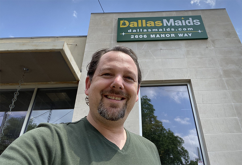 Greg in front of Dallas Maids' office