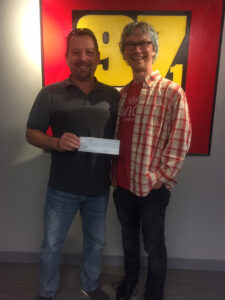Dallas Maids - Giving a Check to Jerry Caldwell