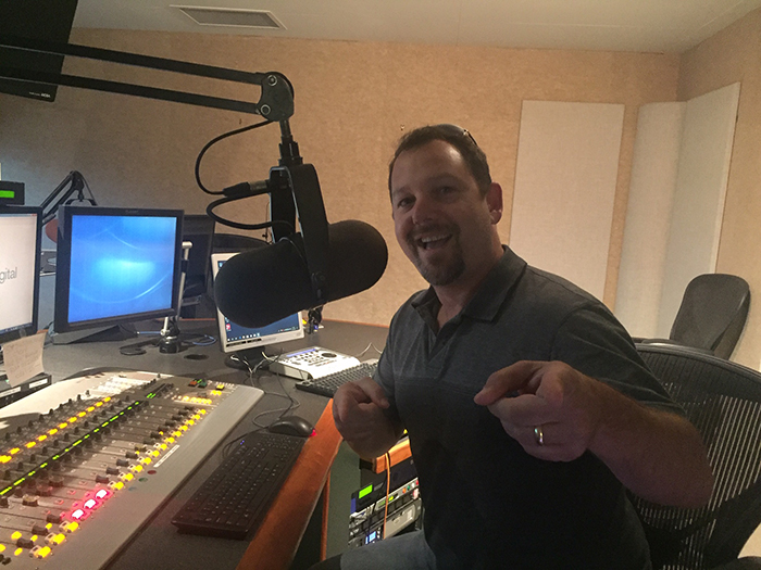 Greg pretending to be a cool DJ