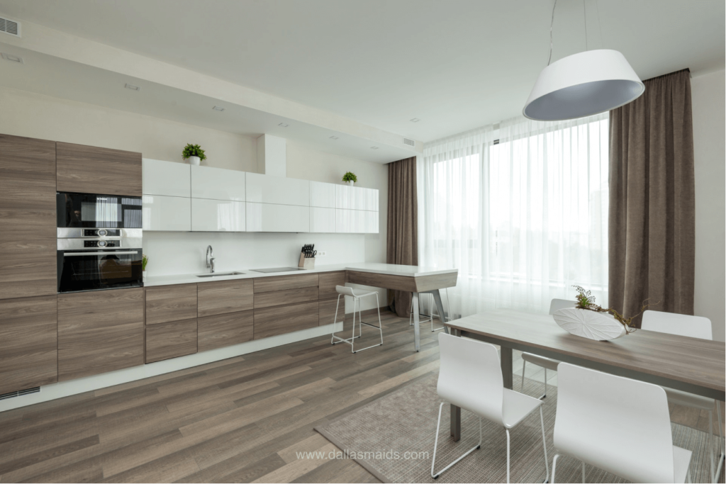 Clean Linoleum Faux Wooden Floors and Kitchen
