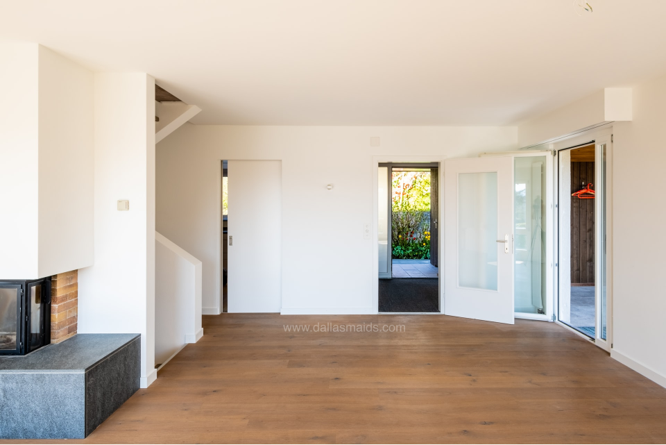 Dallas Maids - Living Area With Clean Hardwood Floors
