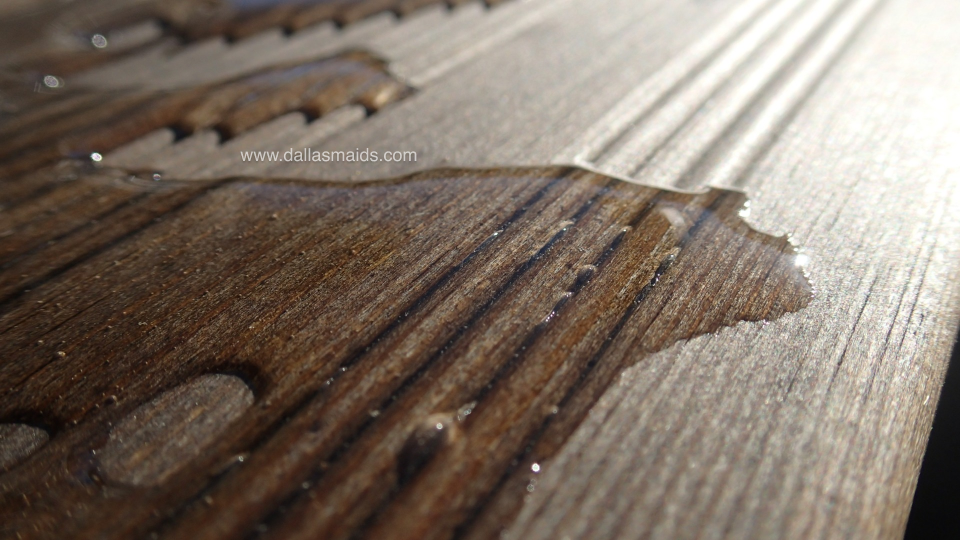 Dallas Maids - Water on a vinyl plank floor